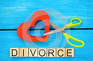 Scissors cut heart. the inscription `divorce`. the concept of breaking relations, quarrels. treachery, betrayal. cancellation of m