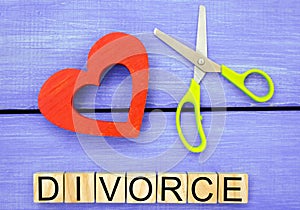 Scissors cut heart. the inscription `divorce`. the concept of breaking relations, quarrels. treachery, betrayal. cancellation of m