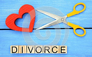 Scissors cut heart. the inscription `divorce`. the concept of breaking relations, quarrels. treachery, betrayal. cancellation of m