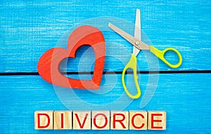 scissors cut heart. the inscription `divorce`. the concept of breaking relations, quarrels. treachery, betrayal. cancellation of m