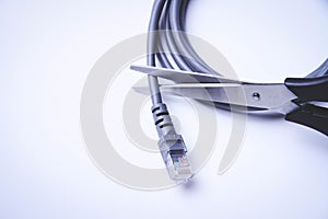 Scissors cut internet cable. Internet shutdown. Cut internet cable.