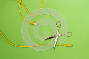 Scissors cut the network cable connector