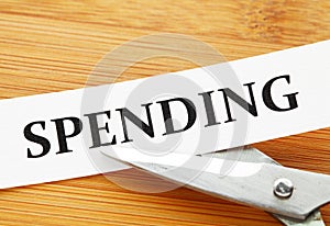 Scissors cut spending