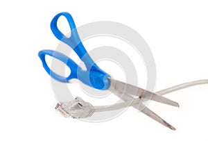 Scissors cutting CAT5E interner cable