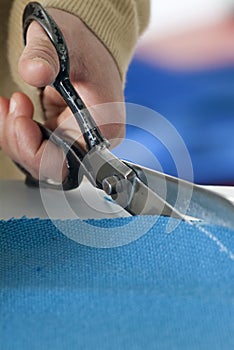 Scissors cutting cloth