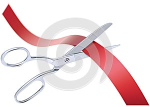 Scissors cutting red ribbon, isolated.