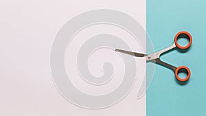 scissors cutting white paper. High quality photo