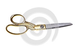 Scissors with golden handle isolated cutout on white background. Tailor, barber tool