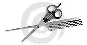 Scissors and hairbrush photo