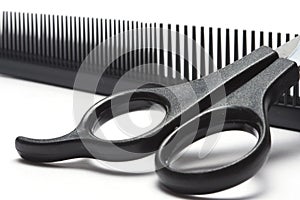 Scissors and hairbrush photo