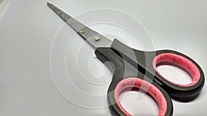 Scissors isolated on black background