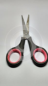 Scissors isolated on black background