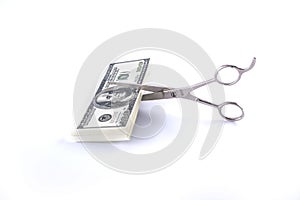 Scissors and money isolated