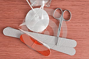 Scissors, nail file and cotton swabs for manicure and pedicure