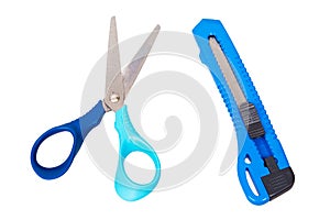 Scissors and paper cutter knife isolated