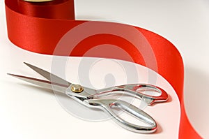 Scissors and red ribbon