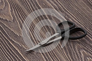 Scissors small sharp with black handles for cutting
