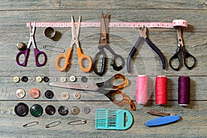 Scissors, thread, buttons and needles for sewing