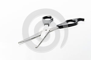 Scissors on white background with copy space