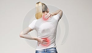 Scoliosis. Spinal cord problems on woman`s back.