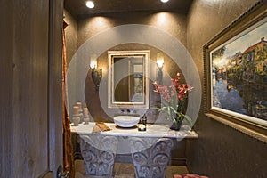 Sconces And Mirror Over Bathroom Sink