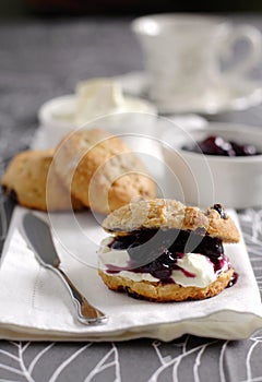 Scone with jam and cream photo