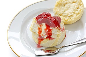 Scone strawberry jam clotted cream photo