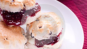 Scones with clotted cream and jam photo