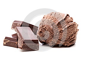 A scoop of chocolate ice cream with three pieces of chocolate isolated