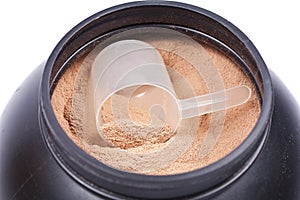 Scoop of chocolate whey isolate protein photo