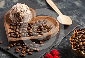 Scoop of coffee ice cream in the heart-shaped bowl - Coffea