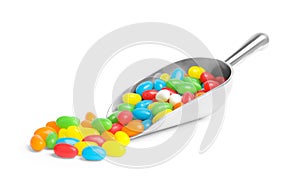 Scoop of delicious color jelly beans on white