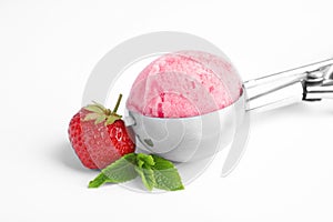 Scoop with delicious  ice cream, mint and fresh berry on white background