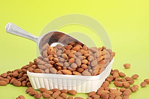 Scoop of fresh almonds