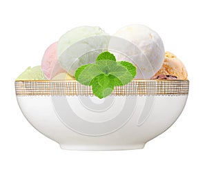 Scoop of fruit ice cream with mint herb in plate isolated on white background