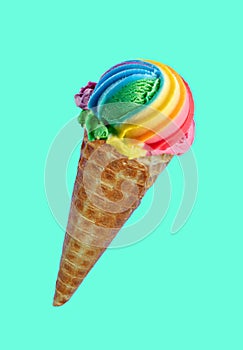 Scoop of Rainbow Colored Ice Cream Cone on Mint Green Background