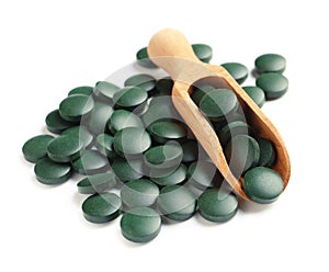 Scoop and spirulina tablets