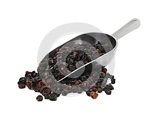 Scoop with tasty dried currants on white background