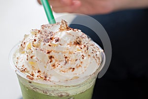 Scoop Whipped Cream on the Green Tea Frappucino