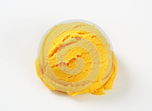 Scoop of yellow sorbet