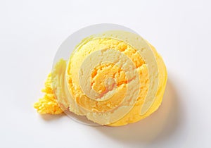 Scoop of yellow sorbet