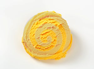 Scoop of yellow sorbet