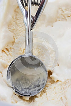 Scooper on Lemon ice cream box.