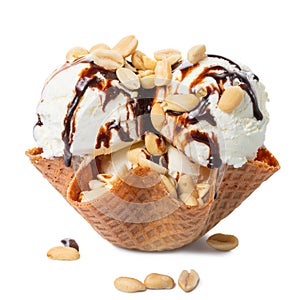 scoops vanilla ice cream decorated chocolate topping and nuts in waffle cone bowl isolated on white