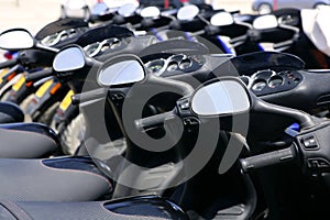 Scooter motorbikes in a row with perspective