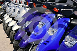 Scooter motorbikes in a row with perspective