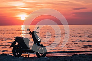 A scooter parked on the sandy beach as the sun sets in the background, casting a warm, orange glow, An electric motorbike parked