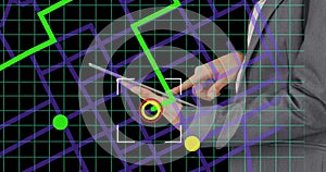 Scope over navigation map line scheme against mid section of businessman using a digital tablet