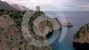 Scopello coast Sicily Italy on a cloudy day aerial view at the house and the coast of Sicily