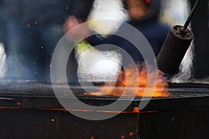 Scorching a grill with fire. Gas burner with flames